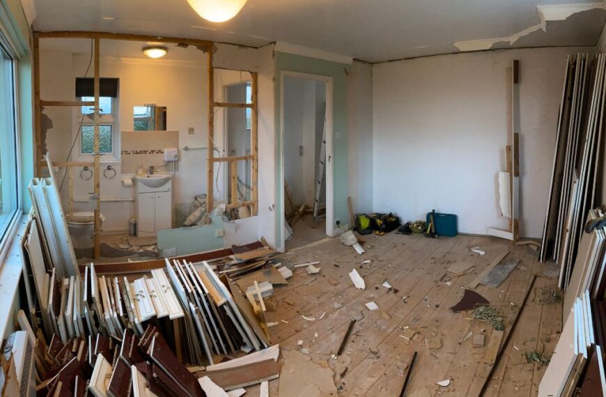 A room filled with dismantled walls and construction debris at Trewena.